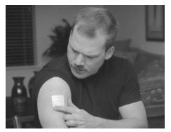 Transdermal patches are worn on the skin between the neck and the waist, and provide a steady delivery of nicotine through the skin. Patches come in varying strengths, and after several weeks, users can move down to a patch that delivers a lower dose. (Robert J. Huffman/Field Mark Publications. Reproduced by permission.)